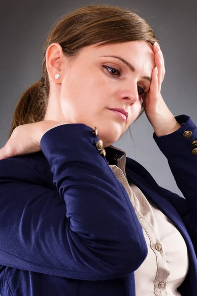 Closeup portrait of a young businesswoman suffering from neck pa — Stock Photo, Image