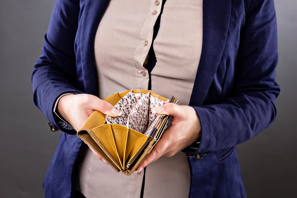 Closeup portrait of a businesswoman looking at an empty wallet — Stock Photo, Image