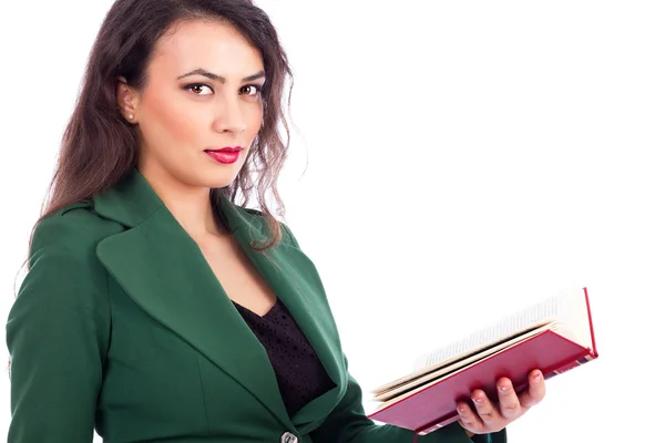 Portrait of a beautiful young woman holding a red book — Stock Photo, Image