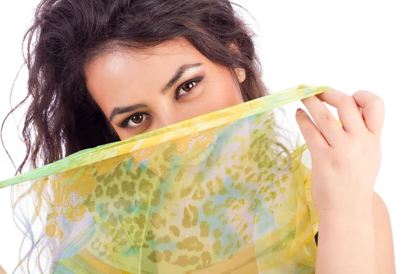 Beautiful young woman with a shawl partially covering her face — Stock Photo, Image