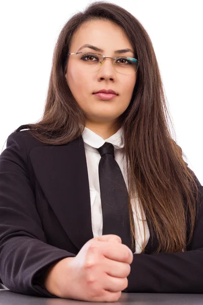 Angry young businesswoman hits desk with her fist — Stock Photo, Image