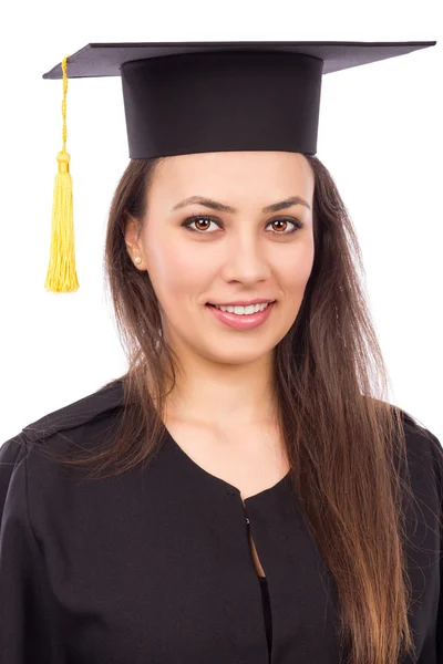 Portrait of a beautiful woman graduate wearing a graduation gown — Stock Photo, Image