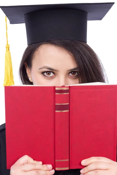 Portrait of a beautiful student in graduation gown  holding a bo — Stock Photo, Image