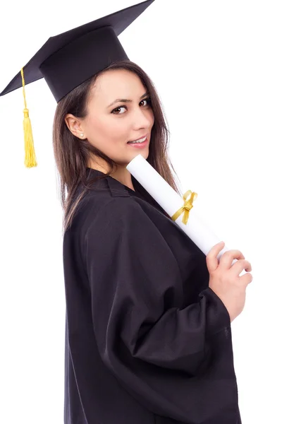 Beautiful woman student in graduation gown holding a diploma — Stock Photo, Image