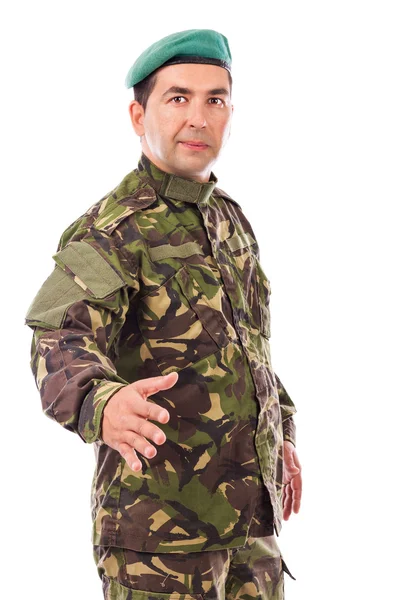 Young soldier with hand outstretched  for a handshake — Stock Photo, Image