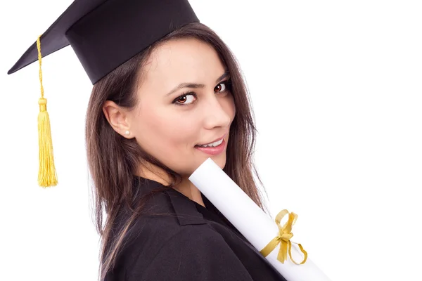 Красивая студентка в выпускном платье с дипломом — стоковое фото