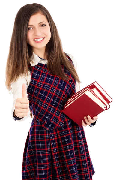 Portréja egy gyönyörű diák lány mutatja az ok jele könyv — Stock Fotó