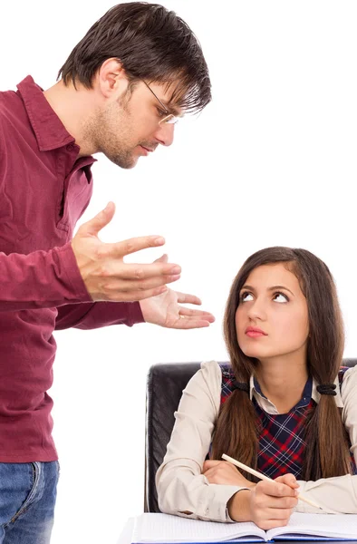 Studio shot di insegnante che spiega qualcosa al suo studente — Foto Stock