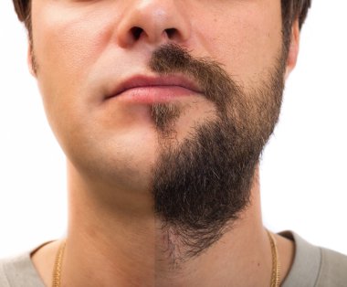 Suratının yarısı üzerinde sakallı closeup 
