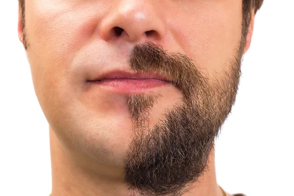 Närbild av mannen med skägg på halva ansiktet — Stockfoto