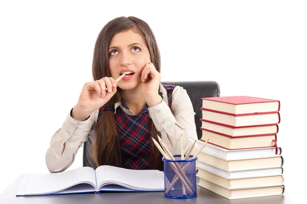 Portrait of a cute schoolgirl thinking hard — Stock Photo, Image