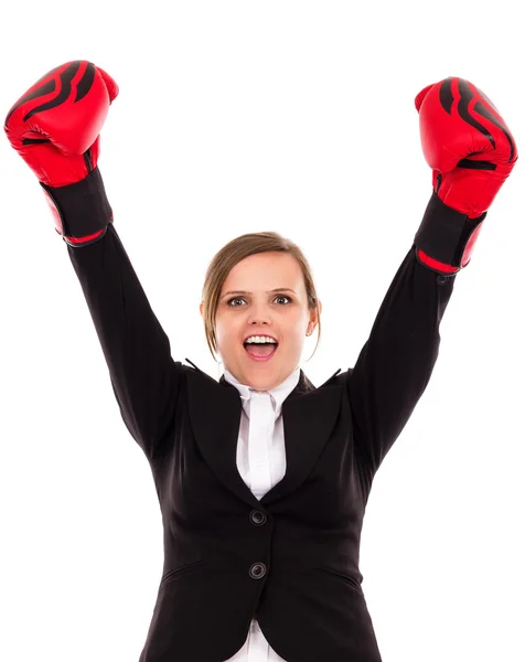 Successful businesswoman celebrating with arms in air wearing bo — Stock Photo, Image