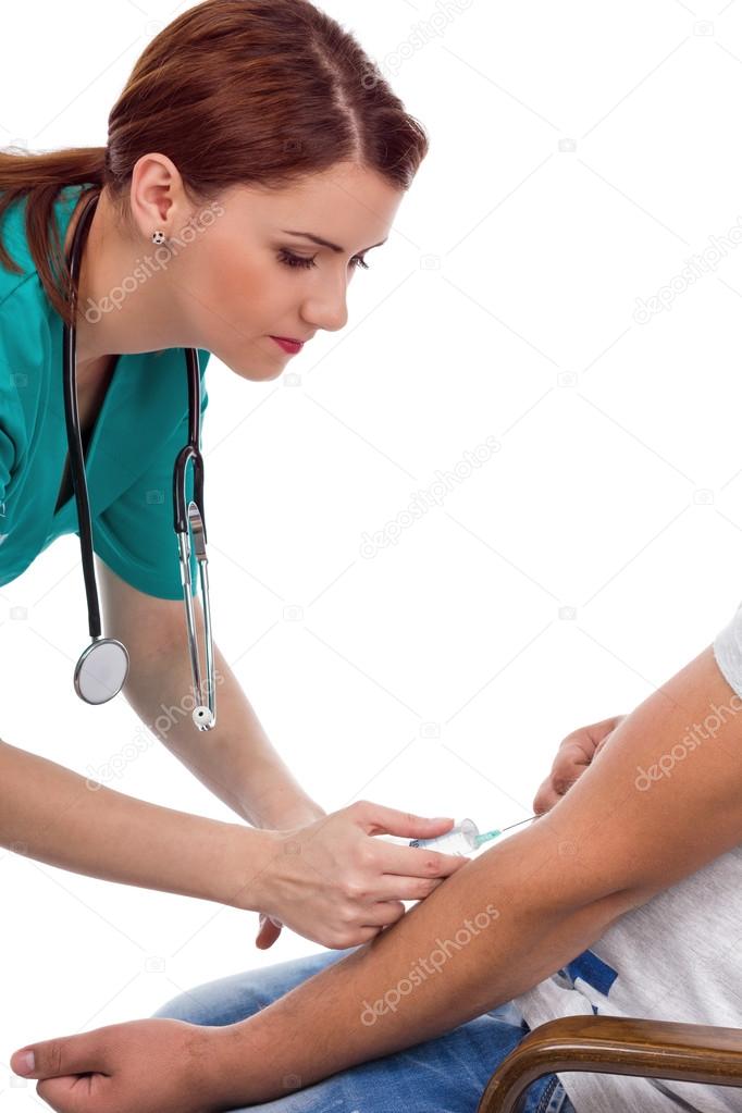  Female doctor with syringe taking blood for test