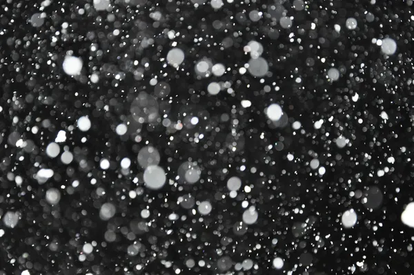 Flocos de neve brancos em preto . — Fotografia de Stock