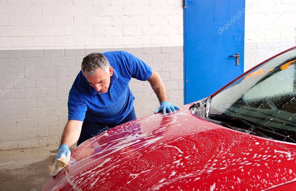 Man washing a car