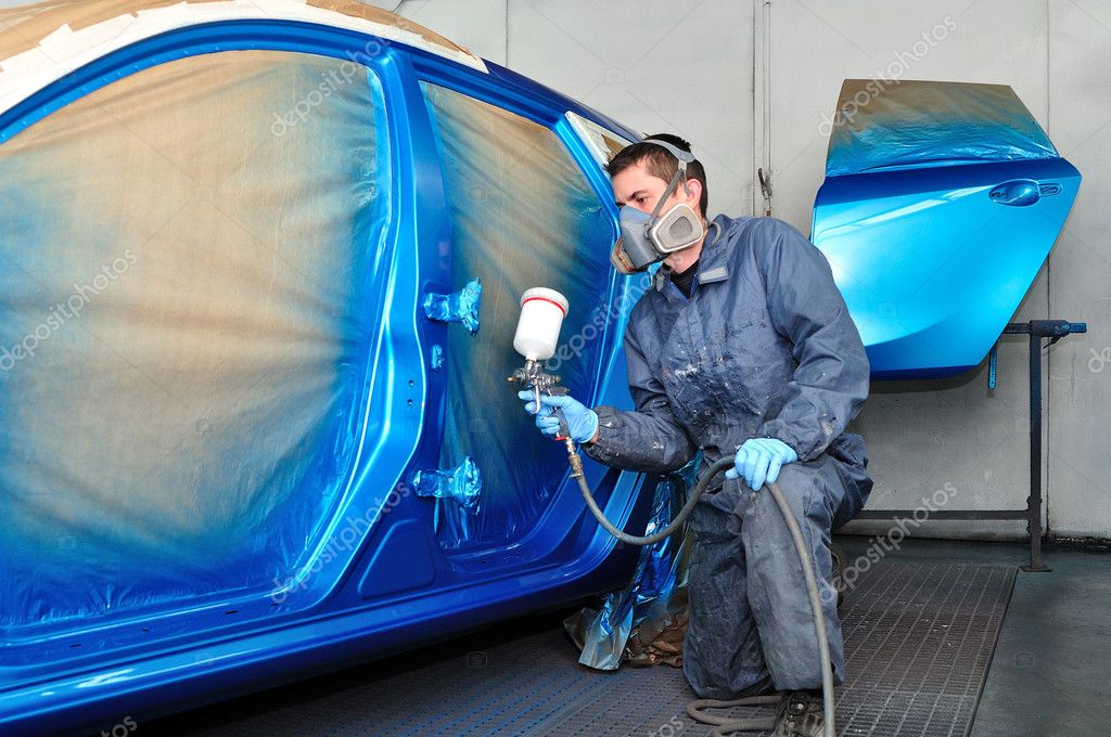 Profesional car painter. — Stock Photo © lorakss 35434961