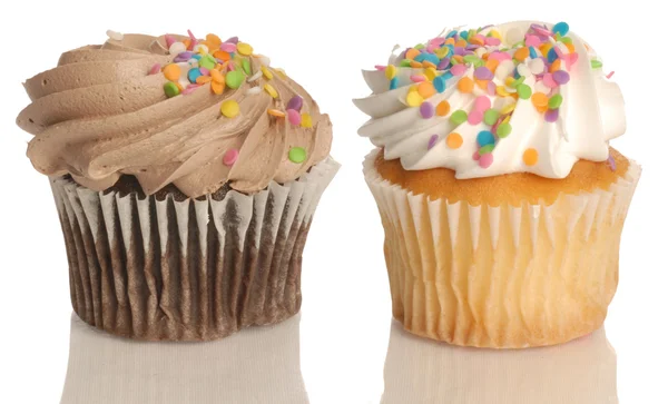 Chocolate and vanilla cupcakes — Stock Photo, Image