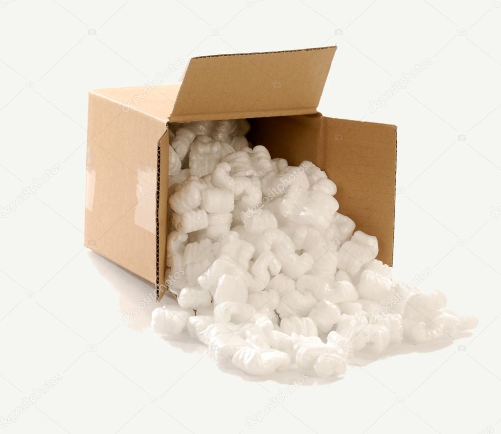 Cardboard carton filled with polystyrene foam chips Stock Photo by  ©willeecole 24136457