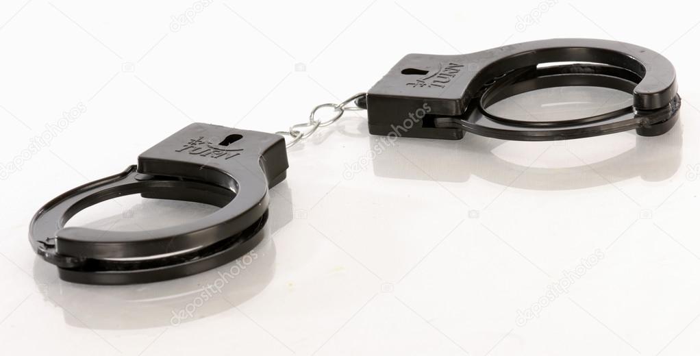 toy hand cuffs with reflection