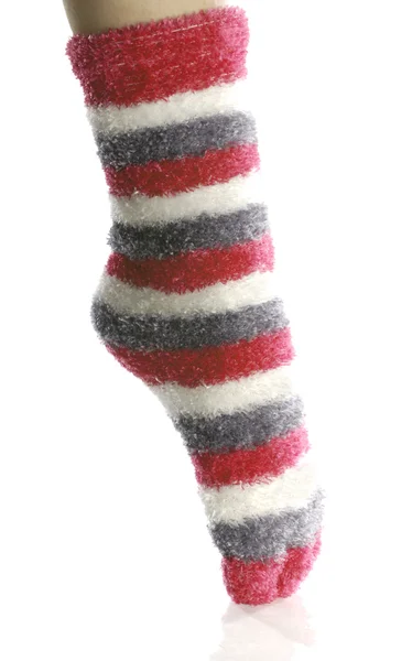 Pointed toe with fuzzy red toe socks — Stock Photo, Image