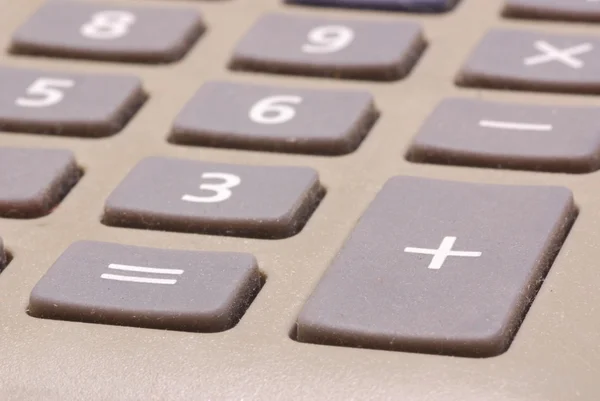 Calculator buttons with selective focus on the plus symbol — Stock Photo, Image
