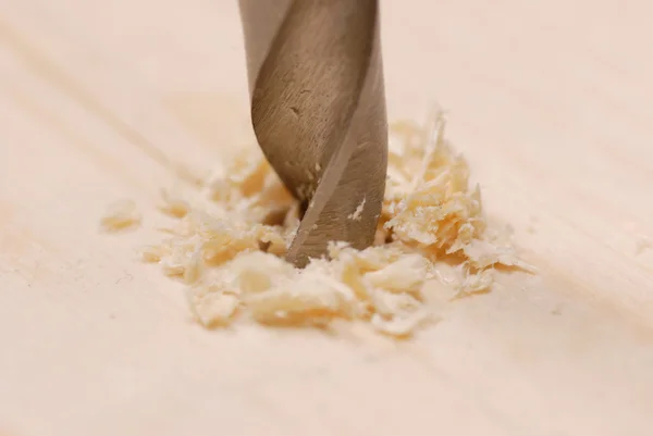 Hole being drilled into wood with shallow depth of field — Stock Photo, Image