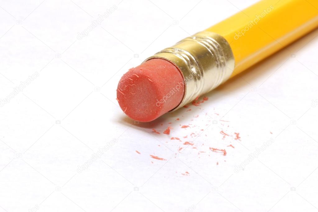 pencil with used eraser end and eraser dust