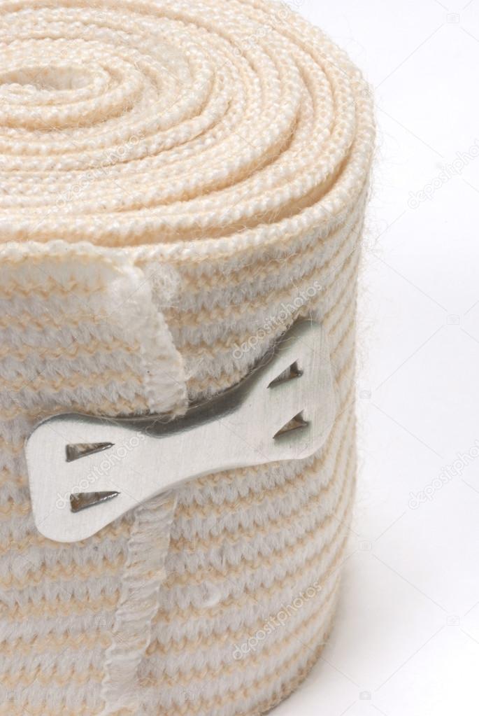 elastic tensor bandage with clip holding it together