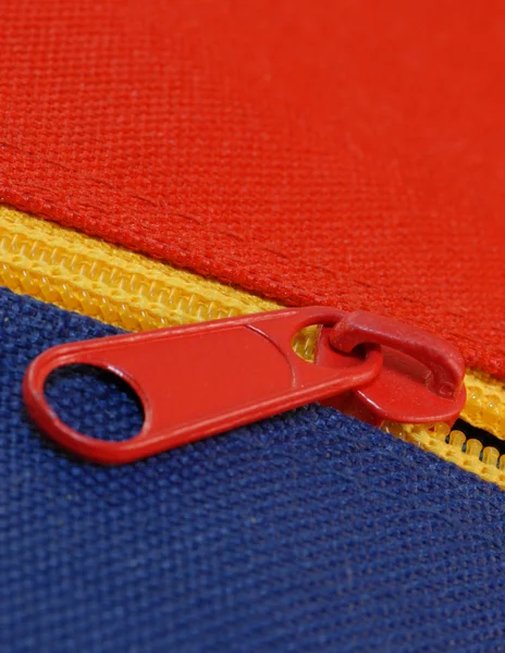 Details of zipper on blue and red canvas bag — Stock Photo, Image