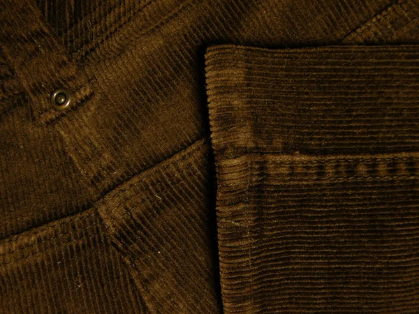 Lähikuva yksityiskohtia ruskea vakosametti housut — kuvapankkivalokuva