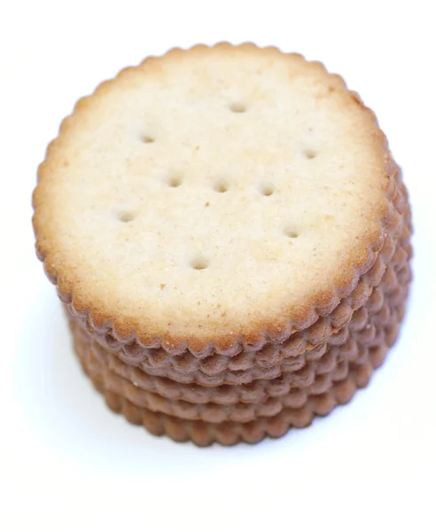 Pila de galletas redondas sobre fondo blanco — Foto de Stock