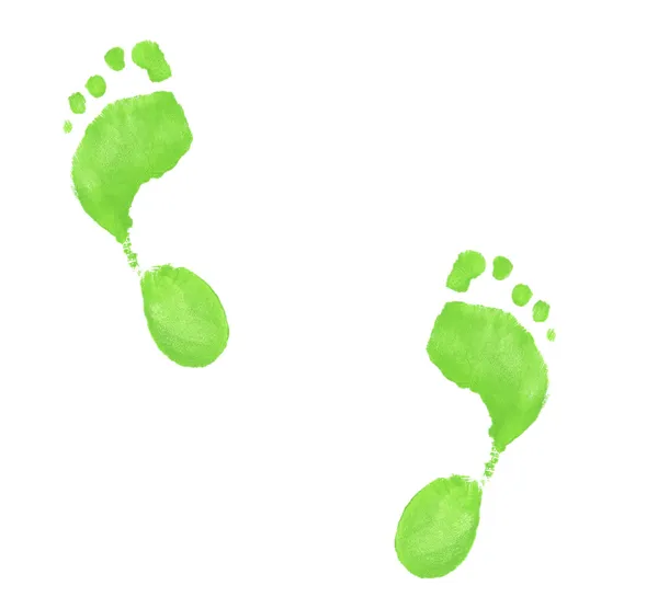 Vert fluo empreintes de pieds peintes sur fond blanc — Photo