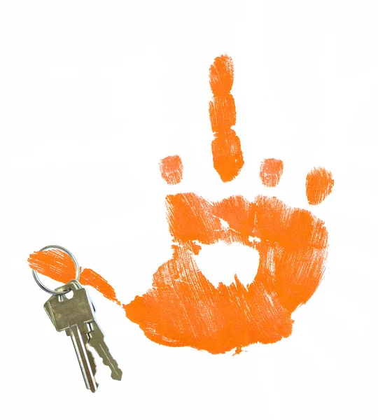 Рука дає знак перевертання з ключами, висячими з великого пальця — стокове фото
