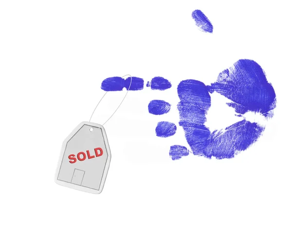 House with sold sign dangling from finger — Stock Photo, Image