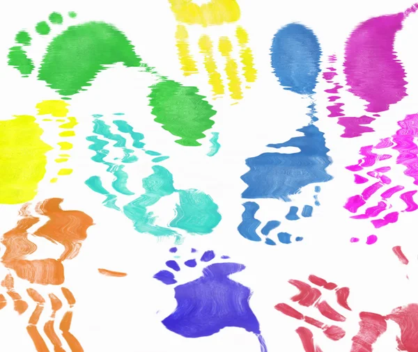 Multi colored expressive hand and foot prints background — Stock Photo, Image