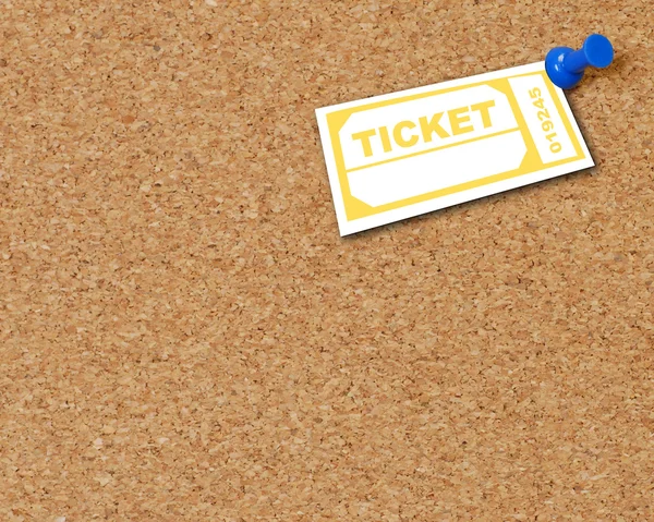 yellow ticket thumb tacked to corkboard - room for copyspace