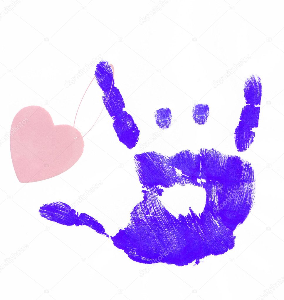 finger painted hand making rock on sign with heart attached