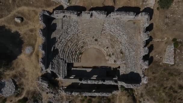 Aerial view of a small standing ancient theater — Stock Video
