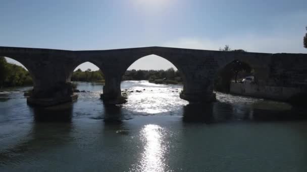 Stone bridge drone crossing — Stock Video