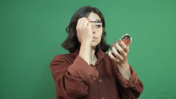 Young Girl Doing Makeup Mirror Her Hand Image Girl Using — стоковое видео