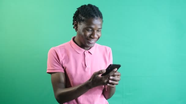 Black Man Texting Excitedly Smiling Black Male Texting Phone Having — Stok Video