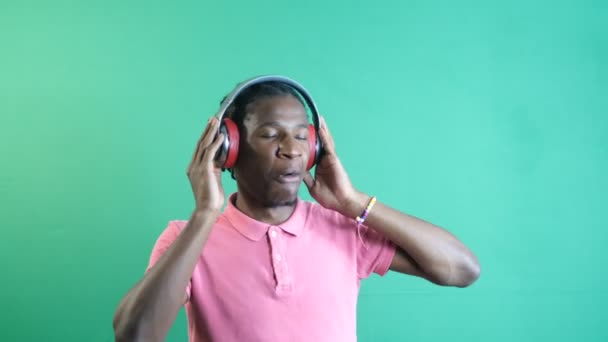 Black Male Model Listening Music Red Headphones Young Dancing Having — Stock Video