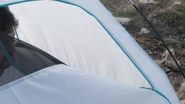 Camper Opening Tent Young Vacationer Male Sleeping Tent Vacationer White — Stock videók