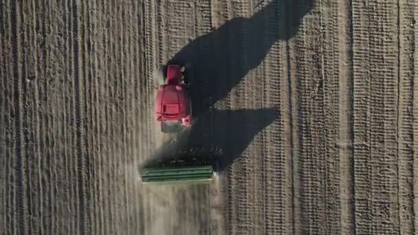Aerial Drone View Tractor Tilling Land Working Tractor Farmland Red — Stock videók