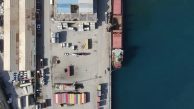 Famagusta port drone view, cargo ships waiting at the port, containers used for maritime trade, large cargo ships anchored in the port