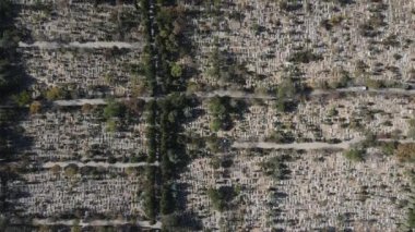 Drone view of the famous Ucler Cemetery in Konya, the white Muslim graves seen from the air, the view of the historical cemetery in Konya