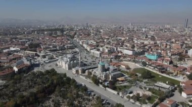 Drone view of historical places of konya from the air, drone view of sultan selim mosque and Mevlana museum, cityscapes with historical buildings side by side