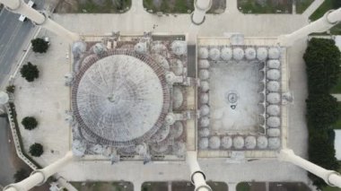 Drone view of the campus of the mosque from the air, islamic holy place with the mosque minaret and dome, sabanci mosque on adana