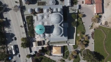 Drone view of historical places of konya from the air, drone view of sultan selim mosque and Mevlana museum, domes of historical mevlana tomb buildings