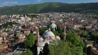 Bursa Green Tomb Square, drone view of old historical buildings in bursa city, the campus of the city of bursa around the green mosque and tomb
